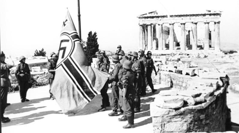 German soldiers raising a swastika on the Acropolis, April 1941