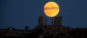 Moon rising over Temple of Poseidon