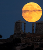 Moon rising over Temple of Poseidon